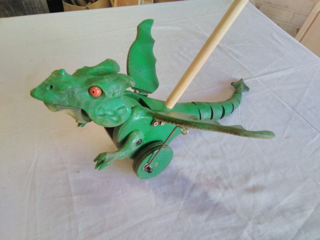 Push pull dragon toy